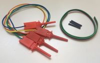 4 hook probes, 1 three-wire ribbon cable (red-black-green) and 3 heat shrink sleeves
